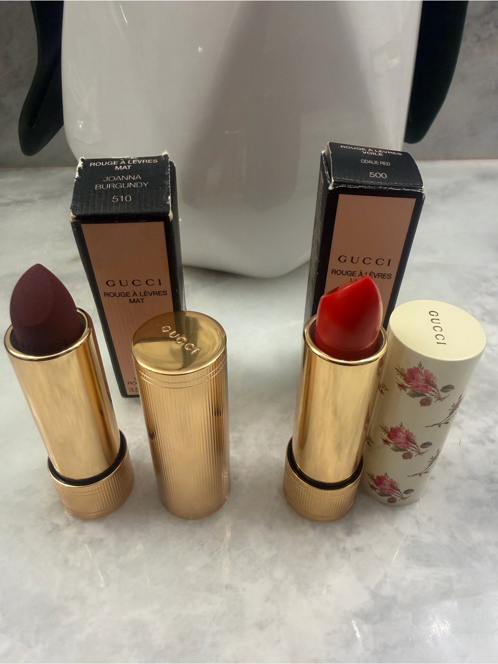 Two Full Size Gucci Lip Sticks